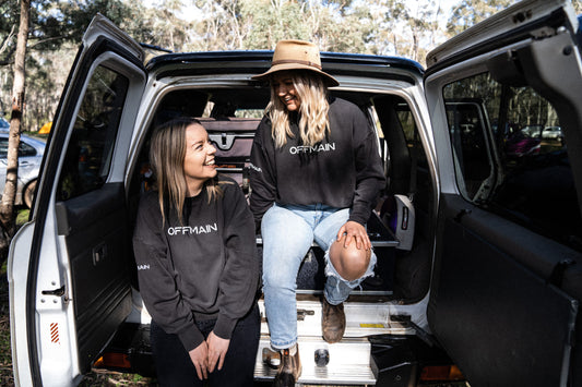 Offmain adventurers on a 4WD vehicle. 